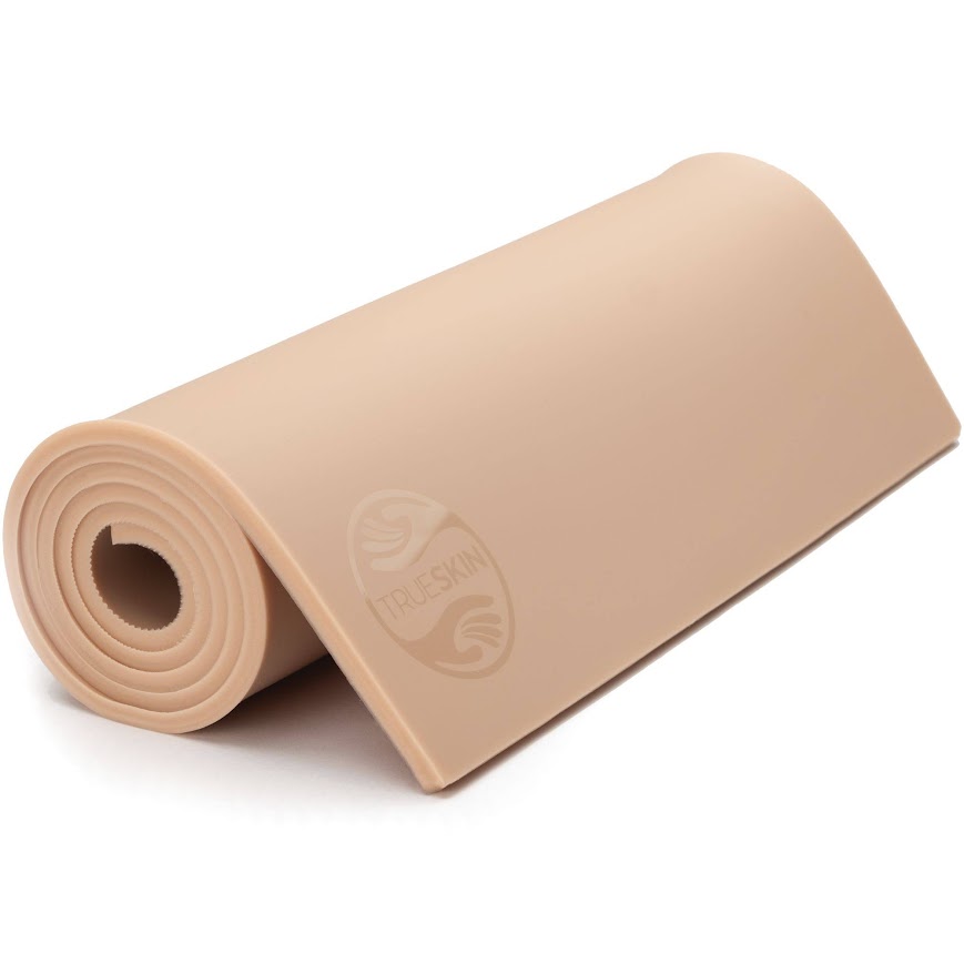 A sheet of TrueSkin practice skin rolled to show its 4–5mm edge.